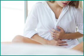 Pain due to cystitis after childbirth in women